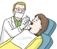 Zahnarzt bei der Behandlung einer Patientin
