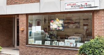 Schaufenster mit Kunsbildern 